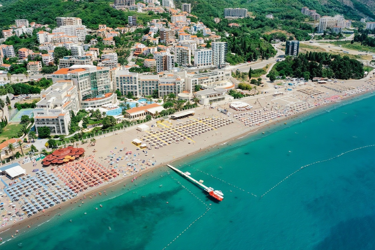 Budva beach in high season — the only place in Montenegro where normal beach vigilance applies