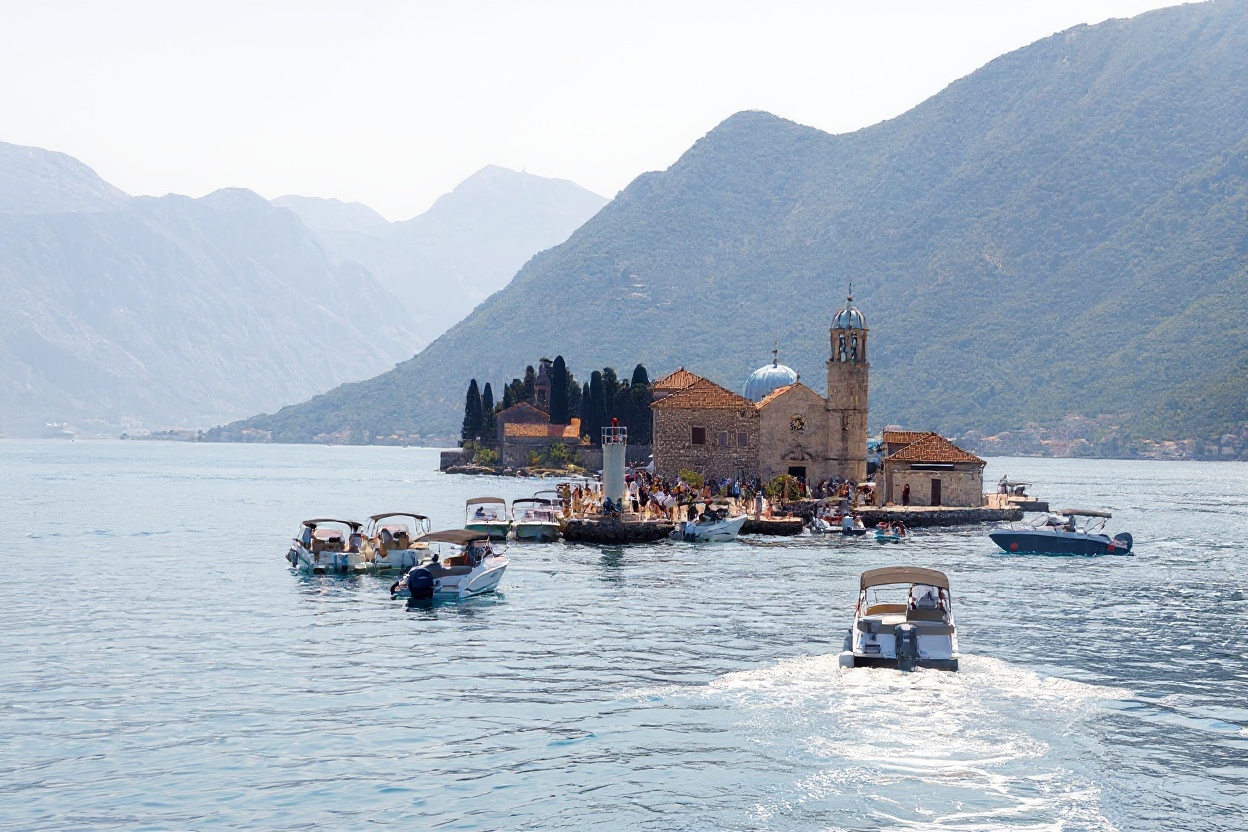 Our Lady of the Rocks — the man-made island built over three centuries by returning sailors